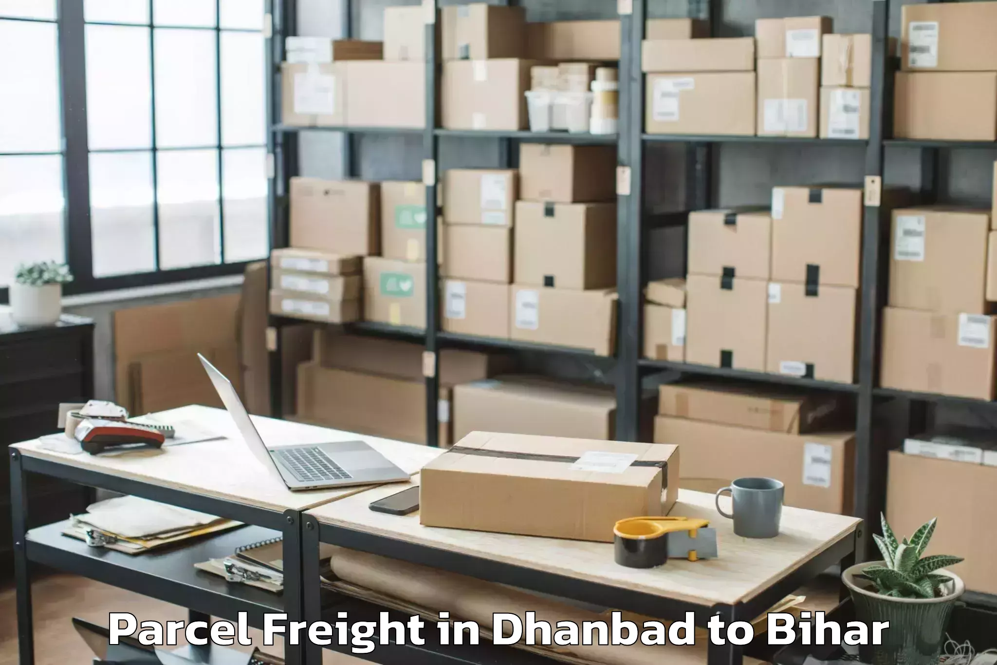 Book Dhanbad to Bharwara Parcel Freight